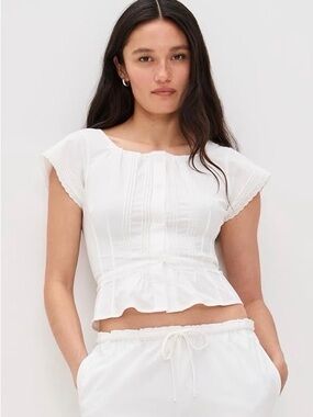 Peachy Den Women's White Eyelet Trim Pintucked Detail Peplum Top